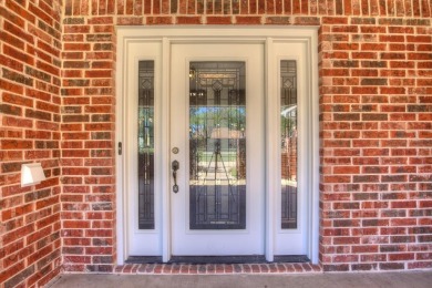 This exceptionally-updated 3 bedroom, 3 bathroom brick home in on Cedar Creek Country Club in Texas - for sale on GolfHomes.com, golf home, golf lot