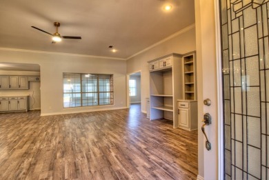 This exceptionally-updated 3 bedroom, 3 bathroom brick home in on Cedar Creek Country Club in Texas - for sale on GolfHomes.com, golf home, golf lot