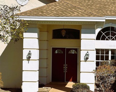 This elegant, spacious residence is set on a beautifully on Harbor Hills Country Club in Florida - for sale on GolfHomes.com, golf home, golf lot