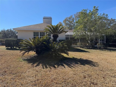 This elegant, spacious residence is set on a beautifully on Harbor Hills Country Club in Florida - for sale on GolfHomes.com, golf home, golf lot