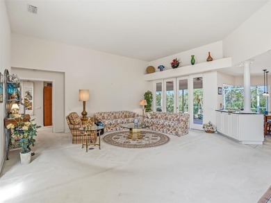 This elegant, spacious residence is set on a beautifully on Harbor Hills Country Club in Florida - for sale on GolfHomes.com, golf home, golf lot