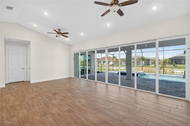 Live the Southwest Florida dream in this award-winning new on Palmetto-Pine Country Club in Florida - for sale on GolfHomes.com, golf home, golf lot