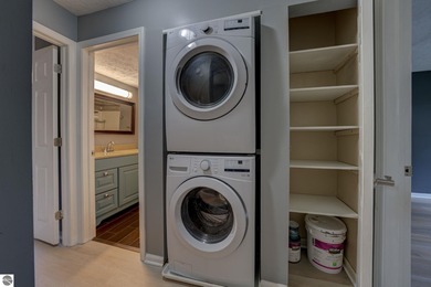 This turnkey lower level condo on 6th fairway of The Crown Golf on Bay Meadows Golf Course - Executive in Michigan - for sale on GolfHomes.com, golf home, golf lot