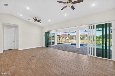 Live the Southwest Florida dream in this award-winning new on Palmetto-Pine Country Club in Florida - for sale on GolfHomes.com, golf home, golf lot