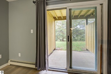 This turnkey lower level condo on 6th fairway of The Crown Golf on Bay Meadows Golf Course - Executive in Michigan - for sale on GolfHomes.com, golf home, golf lot