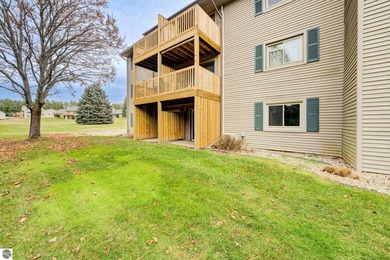This turnkey lower level condo on 6th fairway of The Crown Golf on Bay Meadows Golf Course - Executive in Michigan - for sale on GolfHomes.com, golf home, golf lot