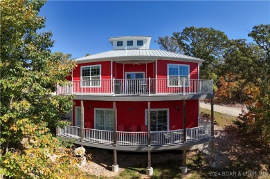 This beautiful 4-bedroom home offers great water views from one on The Oaks Golf Course in Missouri - for sale on GolfHomes.com, golf home, golf lot