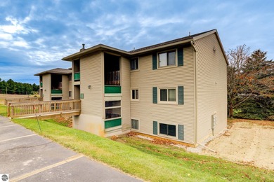 This turnkey lower level condo on 6th fairway of The Crown Golf on Bay Meadows Golf Course - Executive in Michigan - for sale on GolfHomes.com, golf home, golf lot