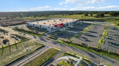 This home is located in a golf community and features an on Twisted Oaks Golf Club in Florida - for sale on GolfHomes.com, golf home, golf lot