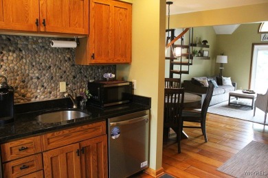 Explore the inviting charm of this beautifully appointed on Holiday Valley Resort in New York - for sale on GolfHomes.com, golf home, golf lot