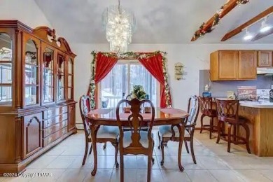 This beautiful contemporary home is a great investment property on Pocono Farms Country Club in Pennsylvania - for sale on GolfHomes.com, golf home, golf lot