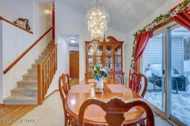 This beautiful contemporary home is a great investment property on Pocono Farms Country Club in Pennsylvania - for sale on GolfHomes.com, golf home, golf lot