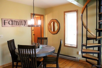 Explore the inviting charm of this beautifully appointed on Holiday Valley Resort in New York - for sale on GolfHomes.com, golf home, golf lot