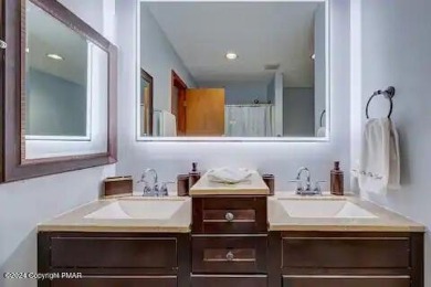 This beautiful contemporary home is a great investment property on Pocono Farms Country Club in Pennsylvania - for sale on GolfHomes.com, golf home, golf lot