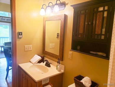 Explore the inviting charm of this beautifully appointed on Holiday Valley Resort in New York - for sale on GolfHomes.com, golf home, golf lot
