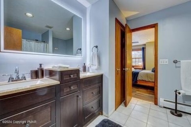 This beautiful contemporary home is a great investment property on Pocono Farms Country Club in Pennsylvania - for sale on GolfHomes.com, golf home, golf lot