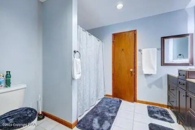 This beautiful contemporary home is a great investment property on Pocono Farms Country Club in Pennsylvania - for sale on GolfHomes.com, golf home, golf lot