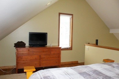 Explore the inviting charm of this beautifully appointed on Holiday Valley Resort in New York - for sale on GolfHomes.com, golf home, golf lot