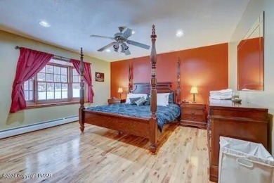 This beautiful contemporary home is a great investment property on Pocono Farms Country Club in Pennsylvania - for sale on GolfHomes.com, golf home, golf lot