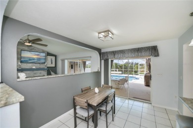 BEAUTIFULLY UPDATED POOL HOME on a large private, oversized on Pinemoor West Golf Club in Florida - for sale on GolfHomes.com, golf home, golf lot