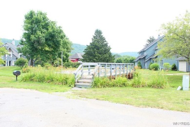 Explore the inviting charm of this beautifully appointed on Holiday Valley Resort in New York - for sale on GolfHomes.com, golf home, golf lot