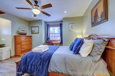 This beautiful contemporary home is a great investment property on Pocono Farms Country Club in Pennsylvania - for sale on GolfHomes.com, golf home, golf lot