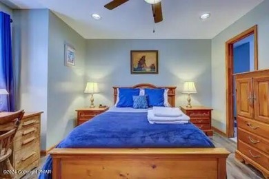 This beautiful contemporary home is a great investment property on Pocono Farms Country Club in Pennsylvania - for sale on GolfHomes.com, golf home, golf lot