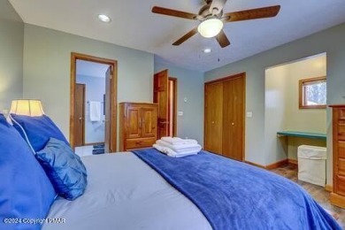 This beautiful contemporary home is a great investment property on Pocono Farms Country Club in Pennsylvania - for sale on GolfHomes.com, golf home, golf lot