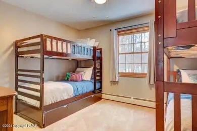 This beautiful contemporary home is a great investment property on Pocono Farms Country Club in Pennsylvania - for sale on GolfHomes.com, golf home, golf lot