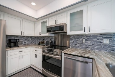BEAUTIFULLY UPDATED POOL HOME on a large private, oversized on Pinemoor West Golf Club in Florida - for sale on GolfHomes.com, golf home, golf lot