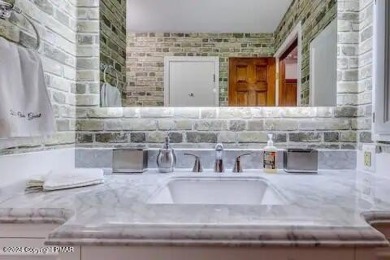 This beautiful contemporary home is a great investment property on Pocono Farms Country Club in Pennsylvania - for sale on GolfHomes.com, golf home, golf lot