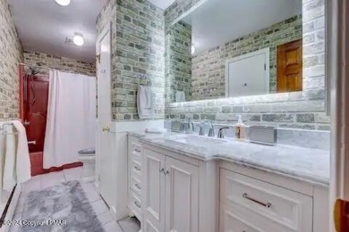This beautiful contemporary home is a great investment property on Pocono Farms Country Club in Pennsylvania - for sale on GolfHomes.com, golf home, golf lot