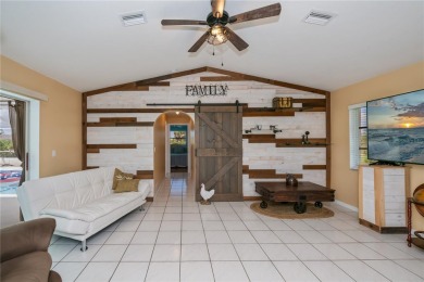 BEAUTIFULLY UPDATED POOL HOME on a large private, oversized on Pinemoor West Golf Club in Florida - for sale on GolfHomes.com, golf home, golf lot