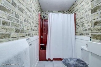 This beautiful contemporary home is a great investment property on Pocono Farms Country Club in Pennsylvania - for sale on GolfHomes.com, golf home, golf lot