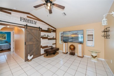 BEAUTIFULLY UPDATED POOL HOME on a large private, oversized on Pinemoor West Golf Club in Florida - for sale on GolfHomes.com, golf home, golf lot