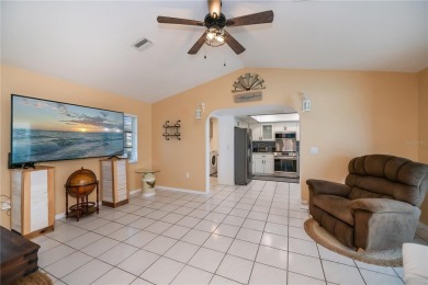 BEAUTIFULLY UPDATED POOL HOME on a large private, oversized on Pinemoor West Golf Club in Florida - for sale on GolfHomes.com, golf home, golf lot