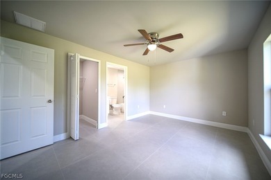 BRAND NEW CONSTRUCTION ON AN OVERSIZED LOT WITH SPINKLERS! You on Mirror Lakes Golf Club in Florida - for sale on GolfHomes.com, golf home, golf lot