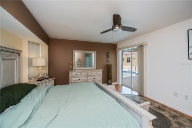 BEAUTIFULLY UPDATED POOL HOME on a large private, oversized on Pinemoor West Golf Club in Florida - for sale on GolfHomes.com, golf home, golf lot