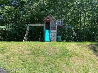 This beautiful contemporary home is a great investment property on Pocono Farms Country Club in Pennsylvania - for sale on GolfHomes.com, golf home, golf lot