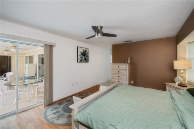 BEAUTIFULLY UPDATED POOL HOME on a large private, oversized on Pinemoor West Golf Club in Florida - for sale on GolfHomes.com, golf home, golf lot