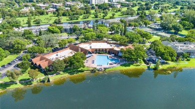 Spacious 2 Bed, 2 Bath First-Floor Condo in International on Inverrary Country Club in Florida - for sale on GolfHomes.com, golf home, golf lot