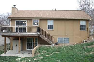 Welcome to this charming split-level home, perfectly suited for on The Deuce At the National Golf Club of Kansas City in Missouri - for sale on GolfHomes.com, golf home, golf lot