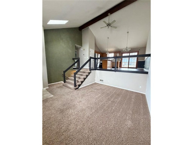 Welcome to this charming split-level home, perfectly suited for on The Deuce At the National Golf Club of Kansas City in Missouri - for sale on GolfHomes.com, golf home, golf lot