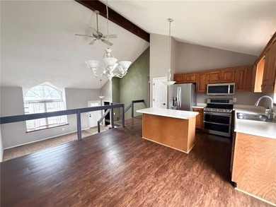 Welcome to this charming split-level home, perfectly suited for on The Deuce At the National Golf Club of Kansas City in Missouri - for sale on GolfHomes.com, golf home, golf lot