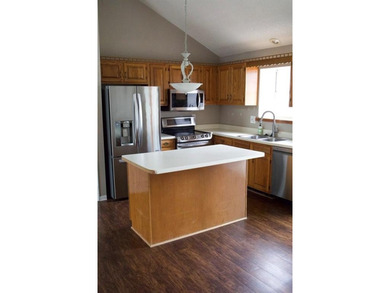 Welcome to this charming split-level home, perfectly suited for on The Deuce At the National Golf Club of Kansas City in Missouri - for sale on GolfHomes.com, golf home, golf lot