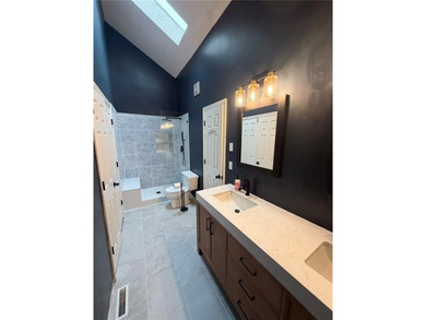 Welcome to this charming split-level home, perfectly suited for on The Deuce At the National Golf Club of Kansas City in Missouri - for sale on GolfHomes.com, golf home, golf lot