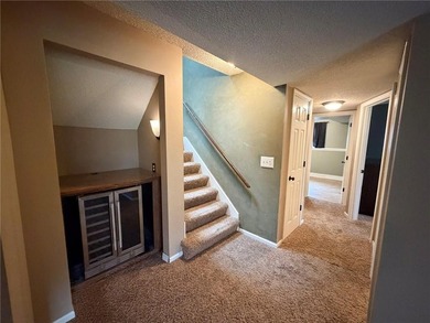 Welcome to this charming split-level home, perfectly suited for on The Deuce At the National Golf Club of Kansas City in Missouri - for sale on GolfHomes.com, golf home, golf lot