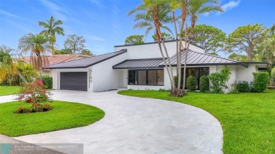 Welcome to this beautifully renovated 5BD/2.5BA home in Seagate on Hamlet Country Club in Florida - for sale on GolfHomes.com, golf home, golf lot