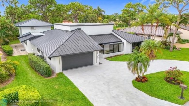 Welcome to this beautifully renovated 5BD/2.5BA home in Seagate on Hamlet Country Club in Florida - for sale on GolfHomes.com, golf home, golf lot