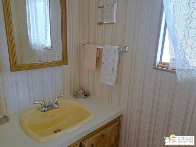 Located in a beautiful countryside setting at the entry to the on Desert Crest Country Club in California - for sale on GolfHomes.com, golf home, golf lot